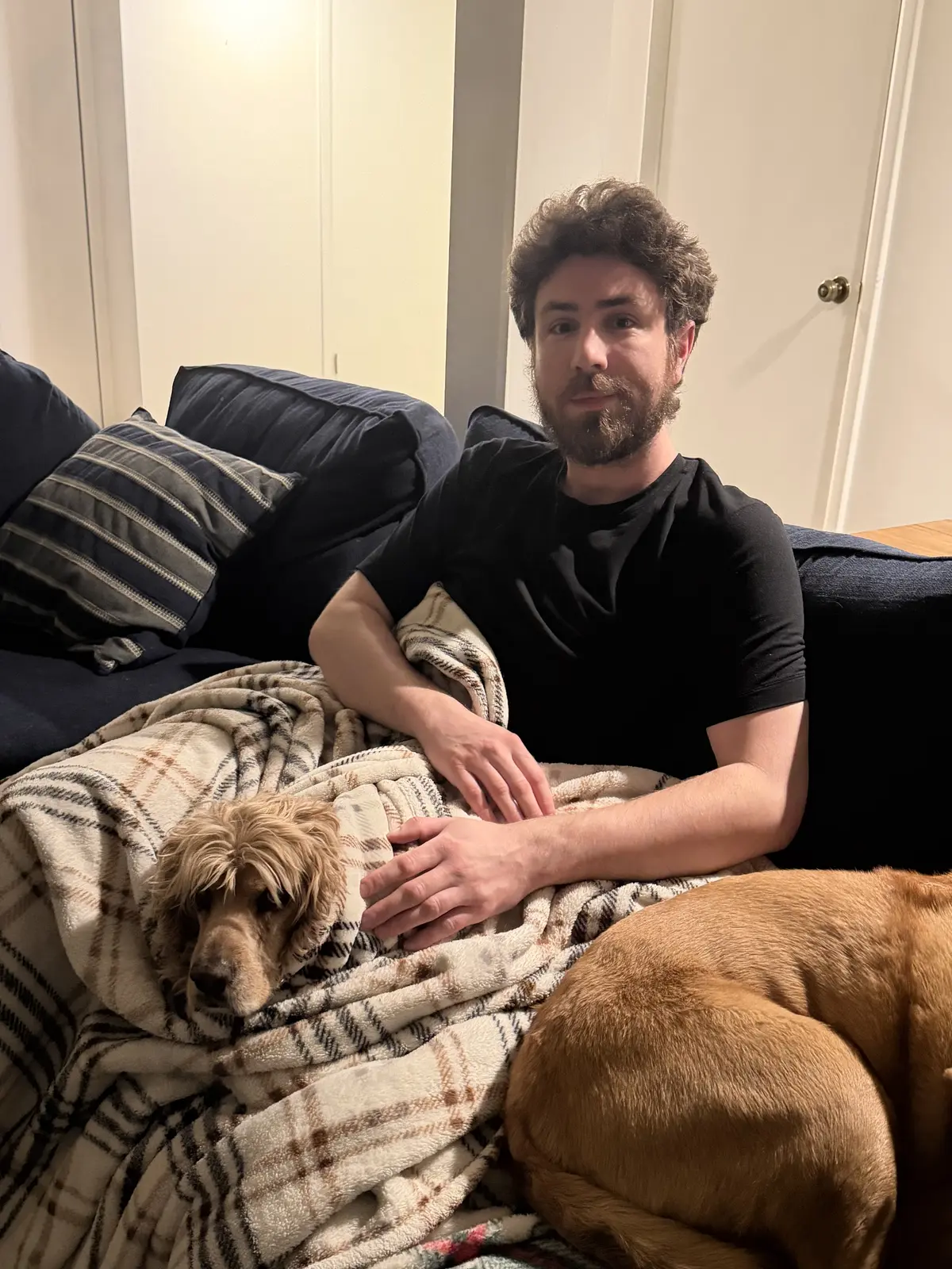 Bundled: I was received onto the couch and wrapped in a blanket. I'm finding it hard to complain.